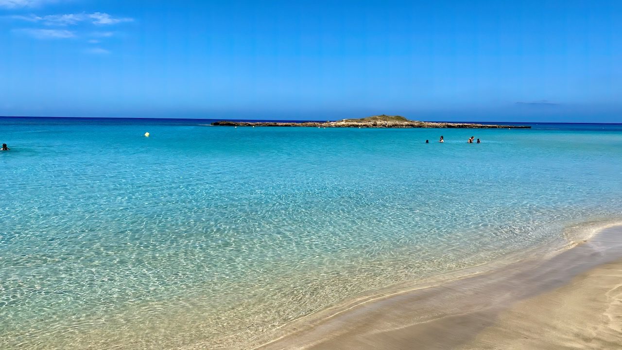 Crystal-clear waters of Fig Tree Bay, a serene destination reflecting the Mediterranean Sea Cyprus's beauty and the Blue Lagoon Cyprus's charm.